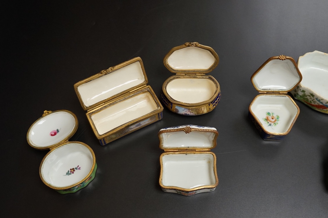 A collection of Continental hand painted and enamelled patch boxes, largest 9cm wide